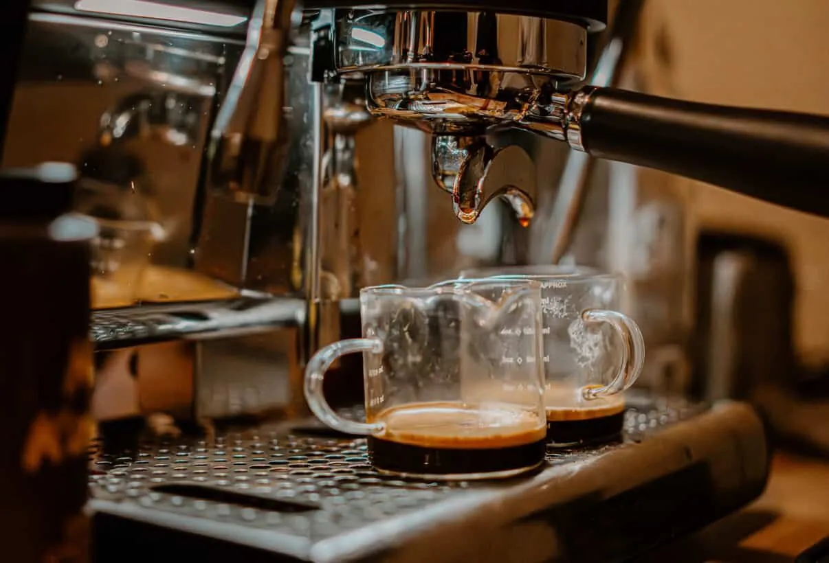 Two espresso shots pulling into glass cups on the mobile espresso bar
